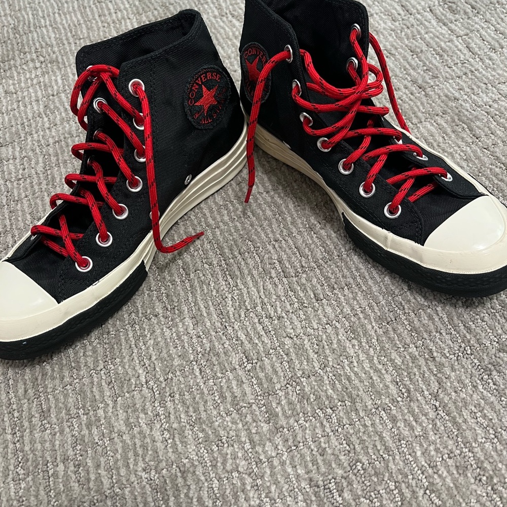 Black, white, and red converse